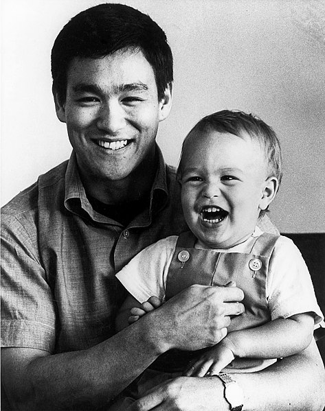 Bruce Lee with his son Brandon in 1966